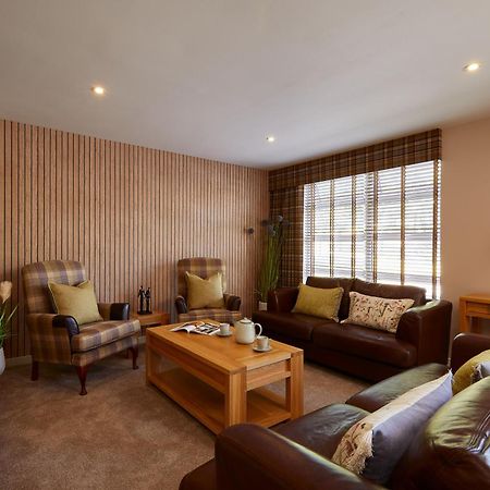 Macdonald Woodland Lodges At Macdonald Aviemore Resort Bagian luar foto